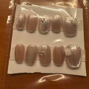 Petal Glow" Press-On‎ Nail Set – Nude Shimmer with Floral & Rhinestone Accents